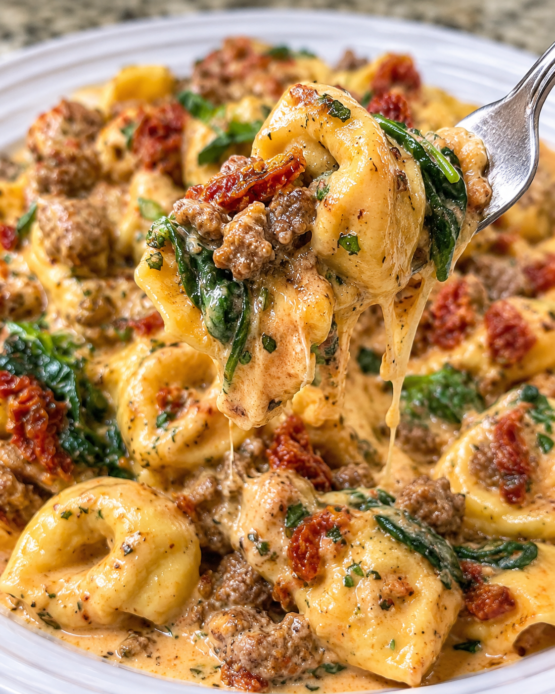Tuscan Ground Beef Tortellini in Sun-Dried Tomato Parmesan Sauce